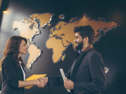 Two sales engineers conclude an international negotiation