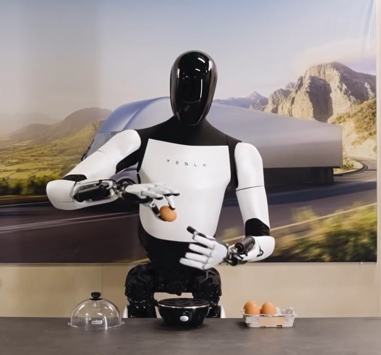 Imagen del robot Optimus de Tesla manipulando un huevo sin romperlo.